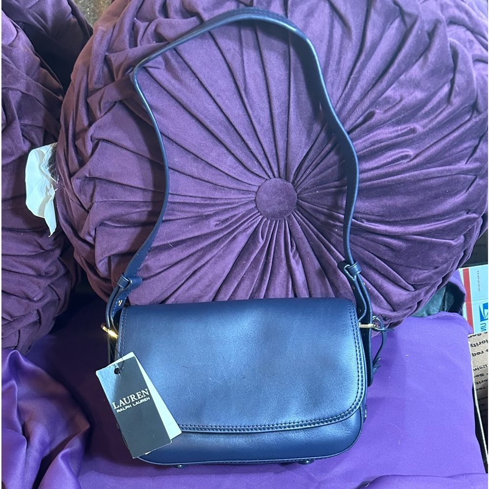 NWT Ralph Lauren navy  leather with adjustable straps.Gold tone hardware